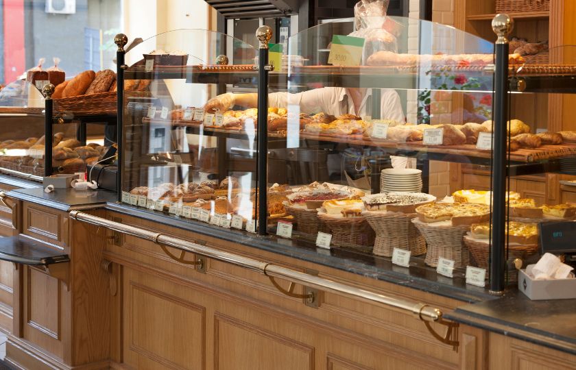 Bakery front of house with food on display Bakery front of house with food on display